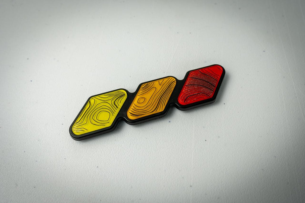 2016-2023 Tacoma Tri Bar Topographic Grille Emblem